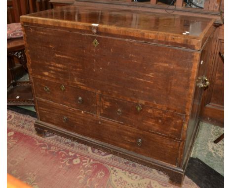 A George III mahogany and walnut mule chest, crossbanded top, two short drawers over one long, bracket feet. 99cm high x 120c