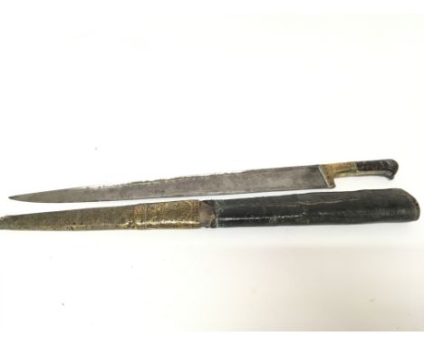 A 19th century Turkish ottoman Yataghan sword with decorated brass fittings and horn handle steel blade length 66cm +