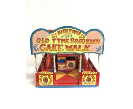 A handmade model of the Old Tyme Brooklyn Cakewalk with functioning moving feature. 58cm long 23.5cm tall. This lot cannot be