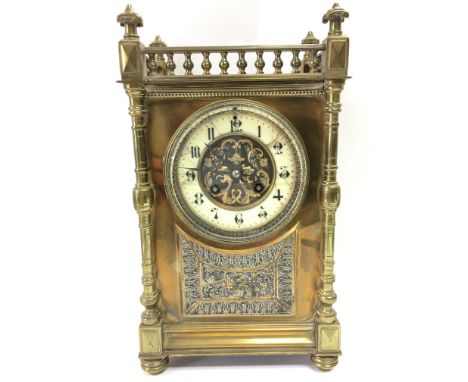 An Ornate brass mid 19th century French mantle clock with pendulum. Dimensions 12x18x31. This lot cannot be posted