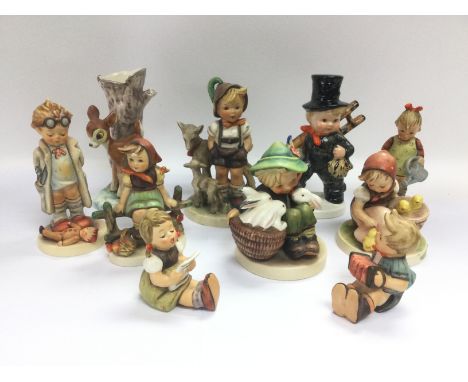 A collection of Goebel Hummel figurines. Shipping category D.