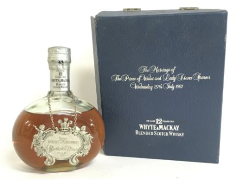 A boxed bottle of 12 year old Whyte and Mackay Scotch whisky Royal Wedding edition. This lot cannot be posted- NO RESERVE