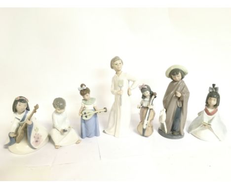 A collection of porcelain Nao figures. This lot cannot be posted