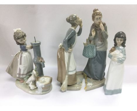 Two boxed Lladro figures and a boxed Nao figure, some damages. Shipping category D.