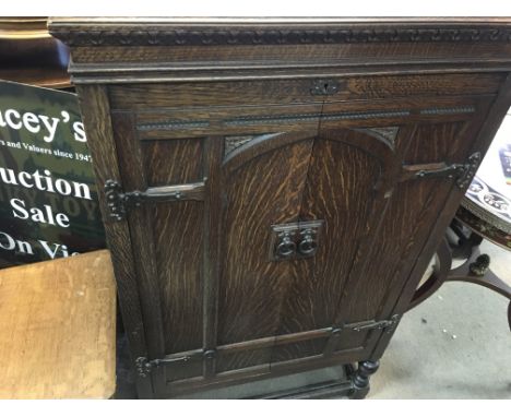 An Oak gramophone cabinet HMV model 202 / 203. 124cm tall 72 cm wide 60 cm deep.- NO RESERVE