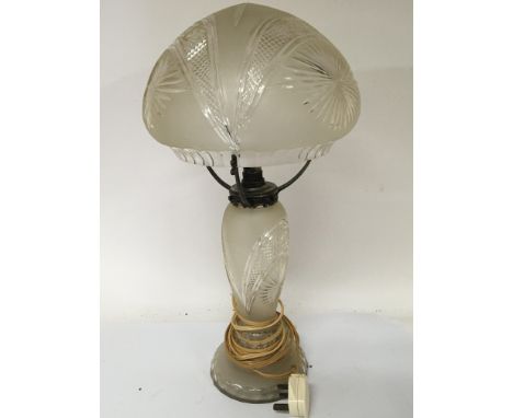 A Quality cut glass table lamp with a dome shape shade with hob-star pattern and shaped edge. No obvious damage height 55cm