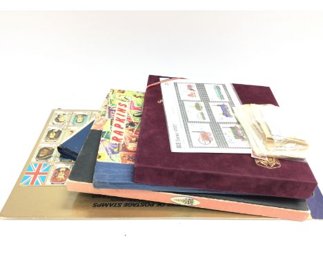 A collection of world Stamps , Esso Squelchers collection, Esso football club badges etc. postage category B. NO RESERVE
