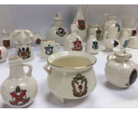 A collection of 38 items of WH Goss ware with various crests and model shapes