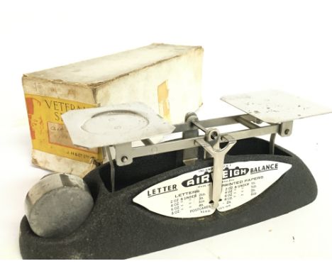 A set of vintage boxed Airweigh chrome postal scales