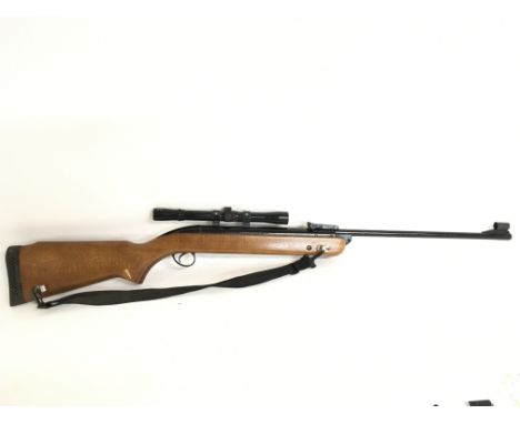 A vintage BSA .22 calibre Air rifle with a model 9 original 4x20 scope. Also including some pellets and a carry bag. This lot