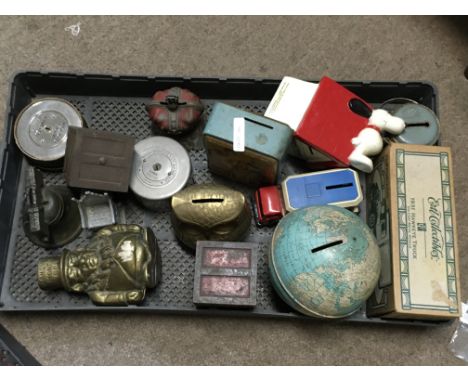 A collection of vintage money boxes including a Chad Valley tin globe, Matchbox truck, brass Transvaal money box. postage cat
