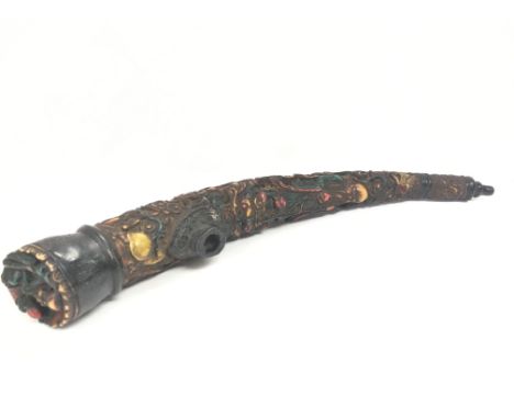 A Chinese smoking ornate pipe with decoration of figures, dragons etc. approximately 41cm long. Postage category C