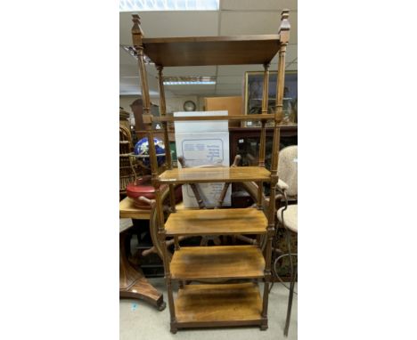 A n edwardian walnut open shelf bookcase. 199cm x 71cm x 31cm