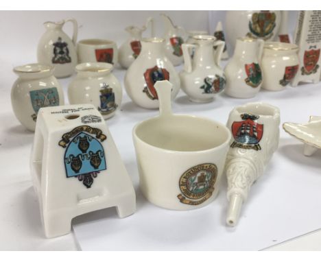 A collection of 46 items of WH Goss ware with various crests and model shapes.
