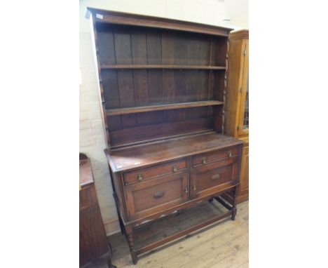 A 1920's oak shelf back dresser