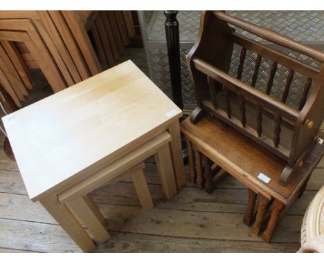A nest of three oak table, a nest of three beech tables, a standard lamp and a magazine rack