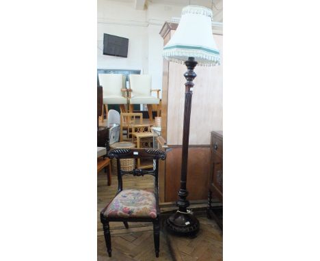 A Victorian carved mahogany dining chair and fluted column standard lamp