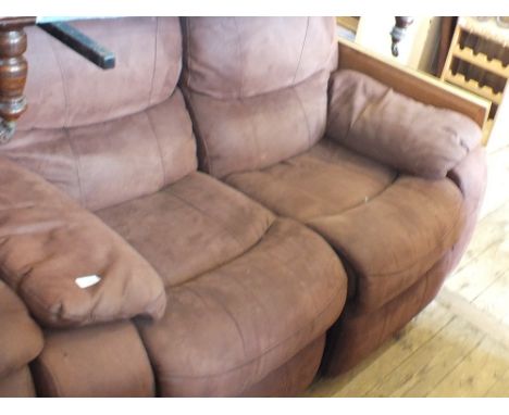 A modern brown suedette reclining two piece two seater sofa
