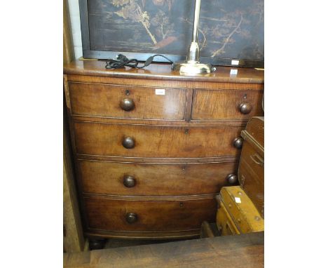 A Victorian mahogany bow front chest of short over two long drawers