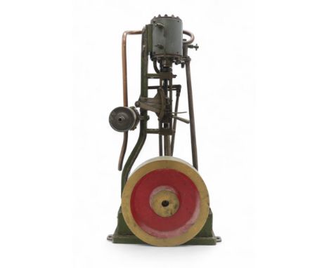 A LIVE STEAM VERTICAL PISTON ENGINE  Of heavy steel and brass construction, with solid flywheel, measuring approx. 43.5cm in 