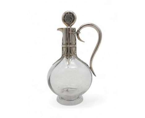 A FRENCH SILVER MOUNTED GLASS CARAFE Cardeihlac, Paris, of lobed baluster form, the silver mounted with fleur de lys girdle, 