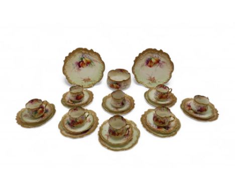 A NAUTILUS TEA SET painted with blackberries and foliage, comprising eight cups, saucers and plates, two cake plates and a sl
