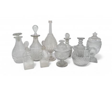 A COLLECTION OF ANTIQUE IRISH CUT GLASS including a preserve pot and lid, a bonbon dish with later lid, assorted decanters, a