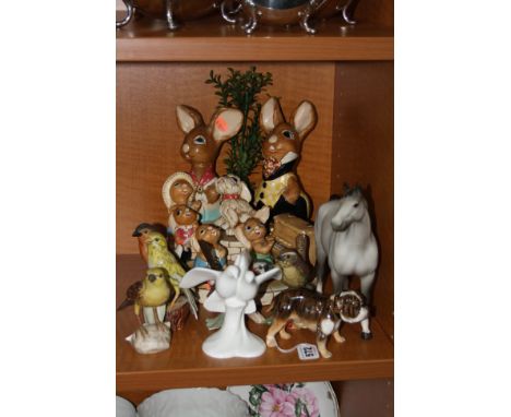 A GROUP OF ORNAMENTS, to include Royal Doulton Bulldog, HN1047, 'Always and Forever' Dove group, HN3550, Beswick 'Swish Tail'