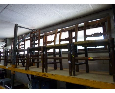 A PAIR OF OAK LADDER BACK CHAIRS, another similar chair and three rush seated chairs (6)
