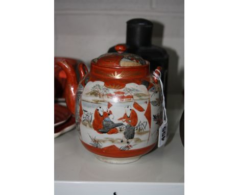 AN ORIENTAL TEAPOT, and an oriental metal tea caddy (2)
