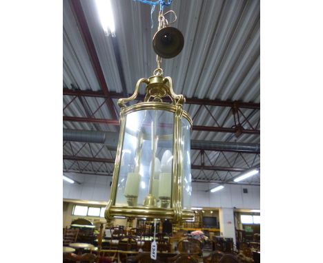 A MODERN BRASS CIRCULAR THREE BRANCH CEILING LANTERN