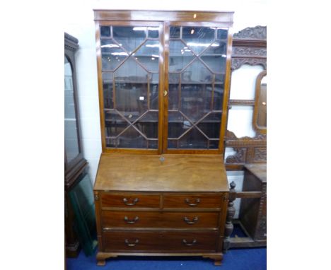 A 19TH CENTURY MAHOGANY ASTRAGAL GLAZED BUREAU BOOKCASE, with two short and two long drawers below and ogee bracket feet supp