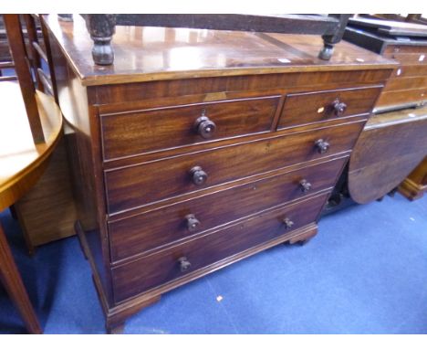 A 19TH CENTURY MAHOGANY CHEST, of two short and three long drawers with ogee bracket feet supports