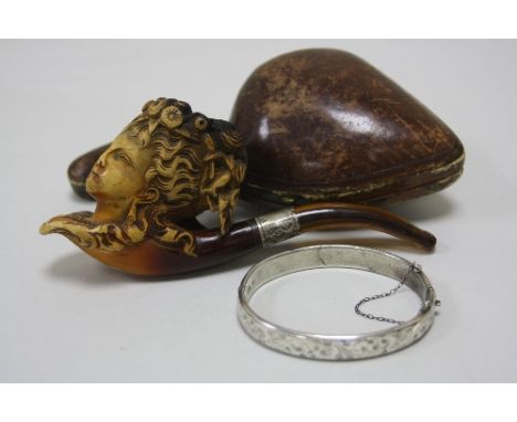 TWO ITEMS, a silver clasp bangle, together with a Meerscham pipe, carving of a lady