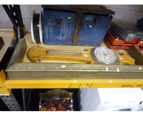 AN OAK BAROMETER, and a brass fender (2)