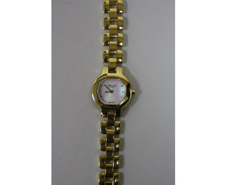 A LADIES TISSOT WRIST WATCH, with mother of pearl face and cubic zirconia detail