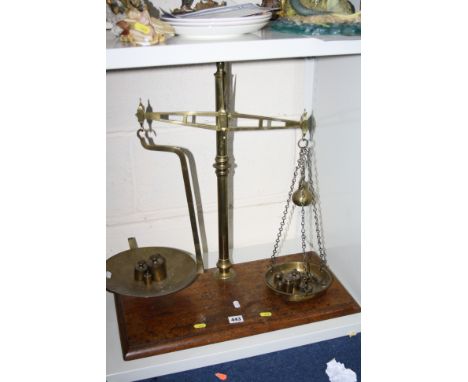 A SET OF BRASS BALANCE SCALES AND WEIGHTS