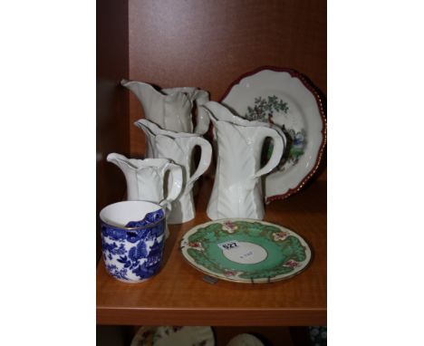 A GROUP OF ROYAL WORCESTER, to include a set of four graduating jugs, moustache cup and two plates (7)