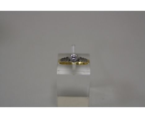 A DIAMOND RING, with single cut diamond to the fancy bi-coloured shank, stamped 18ct and PLAT, ring size N