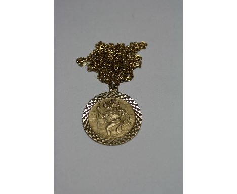 A 9CT GOLD ST CHRISTOPHER PENDANT, to a fine chain, hallmarks for London, length 82cm, weight approximately 14.4 grams, ring 