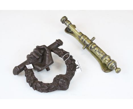 19th Century cast iron door knocker by Kenrick &amp; Sons and a brass cannon knocker 
