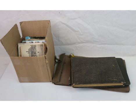 Box containing over 100 vintage post cards and a quantity of photo album 