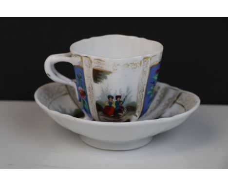 Continental Augustus Rex porcelain cup and saucer with figurative and floral panel decoration