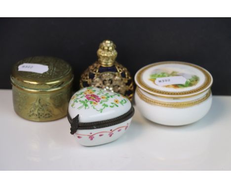 Blue and gilded glass perfume bottle with shell style decoration, two ceramic trinket boxes &amp; one other in brass (4)