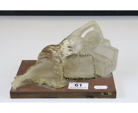 Glass Style Ornament of a Lady reclining on a Step and Cushion on a Wooden Plinth, 20cms long