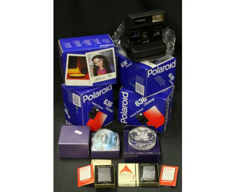 Three boxed Polaroid 366 cameras, two vintage boxed Zippo lighters &amp; two paperweights