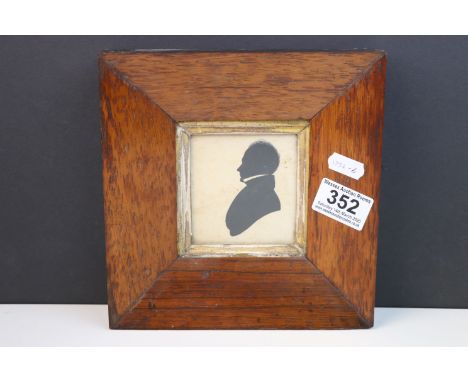 A framed and glazed 19th century silhouette portrait within a rosewood frame.