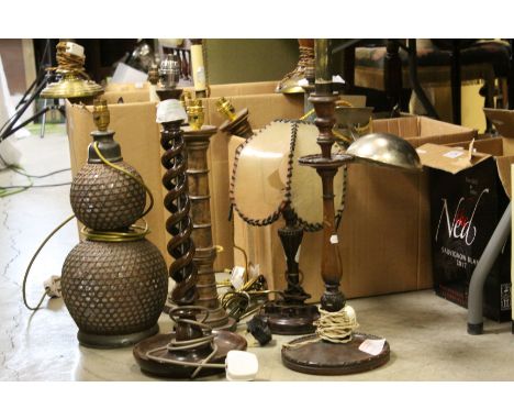 Large quantity of lamps and lights to include treen, brass, copper, double glass gourde lamp with rattan cane cover etc (2 bo