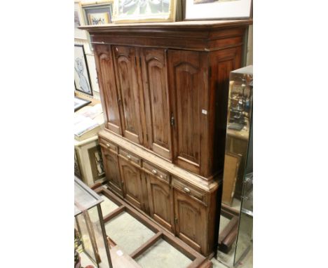 19th century Style Hardwood Cupboard, comprising an upper section with four panel doors opening to shelves above four drawers