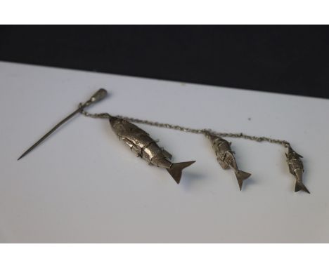 Three White Metal Graduating Articulated Fishes mounted on a chain with stick pin